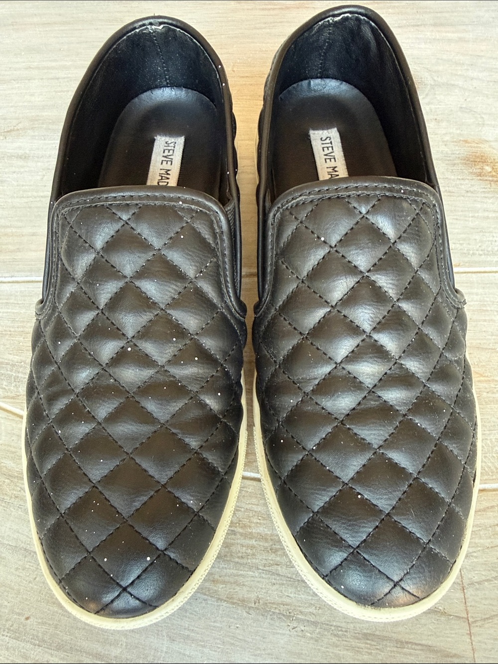 Steve Madden Quilted Black Slip-On Sneakers with Contrasting White Sole